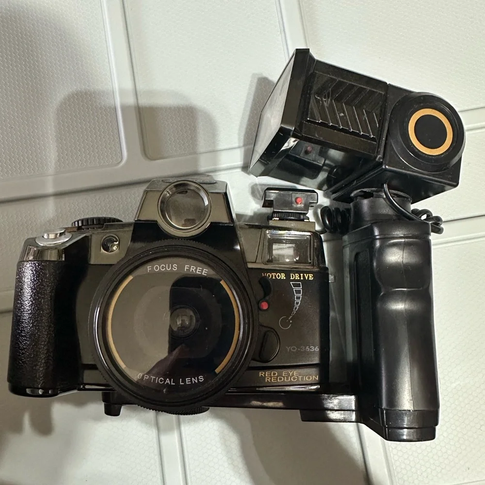 Vintage Canon Motor Drive Red Eye Reduction Black Camera with flash